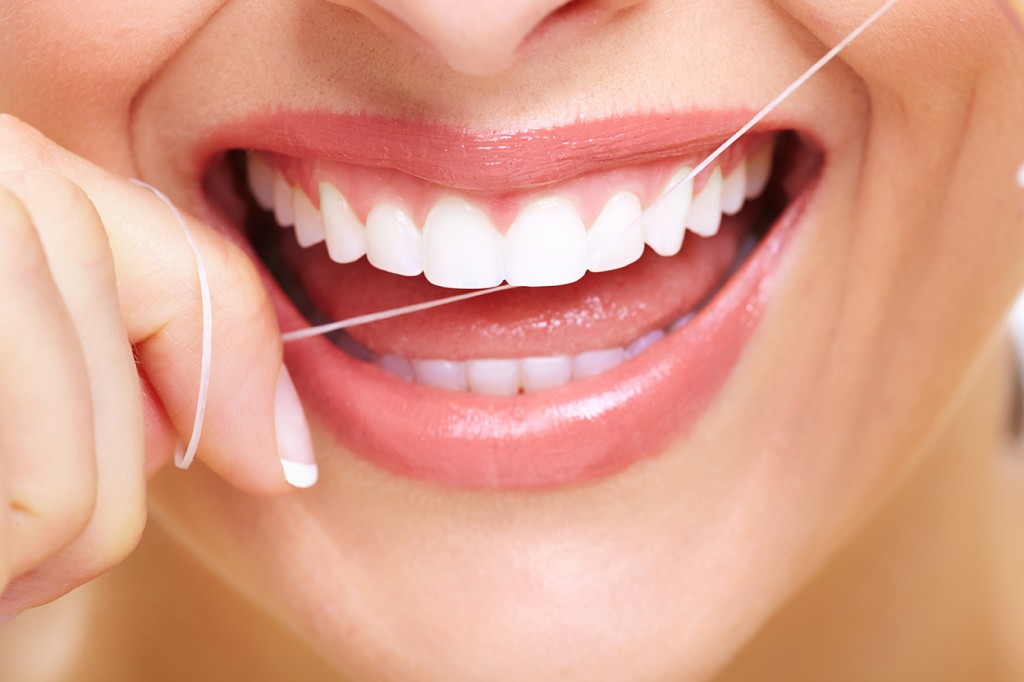 Floss regularly and properly