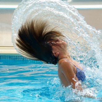 7 Ways To Enjoy Swimming Without Damaging Your Hair