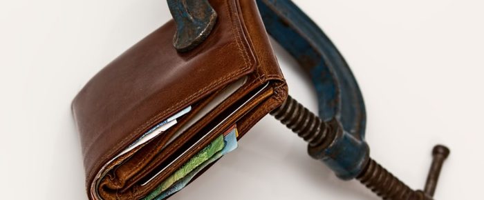 10 Telltale Signs You’re Headed For A Big Debt Trouble